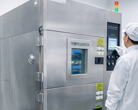 Technician Monitoring Environmental Test Chamber